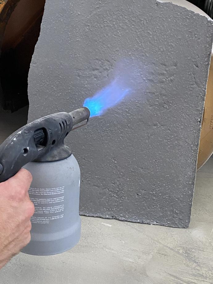 Geopolymer repair mortar applied to an industrial furnace lining